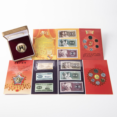 Two volumes of Chinese coin collector's albums +Beijing Olympics Commemorative gold coins