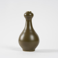 A Chinese mid-Qing teadust-glazed garlic-mouth vase