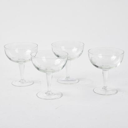 A Set Of Four Rose Etched Vintage Champagne Coupes