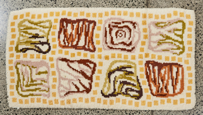 A Patterned Mid Century Looped Pile Rug