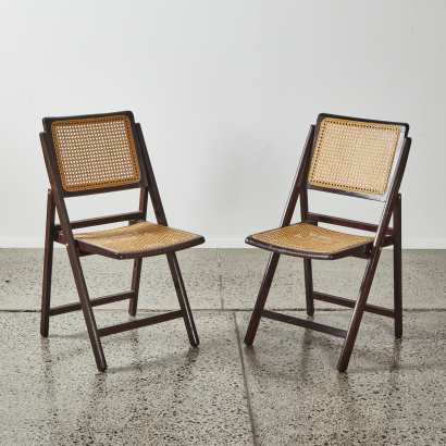 A Pair Of Vintage Rattan Folding Chairs