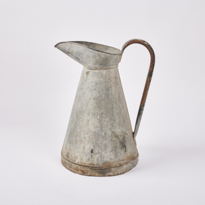 A Large Tin Jug