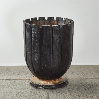 A Large Cast Iron Urn