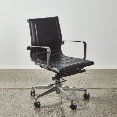 An Eames Style Desk Chair In Black & Chrome