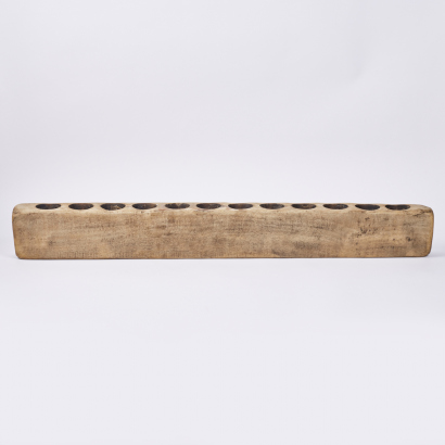 A Long Wooden Candle Holder