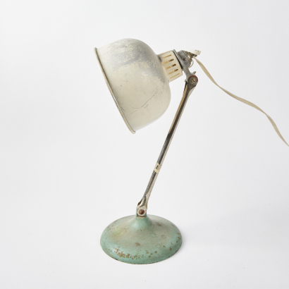 An Industrial Lamp with a Cast Iron Base