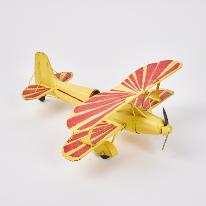 A Vintage Hand Made Tiger Moth Metal Airplane