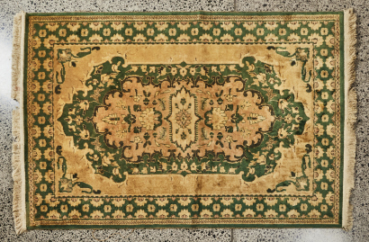 A Large Persian Floor Rug