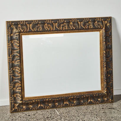 An Ornate Gold Framed Mirror