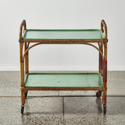 A Vintage Two Tiered Trolley With Rattan Binding