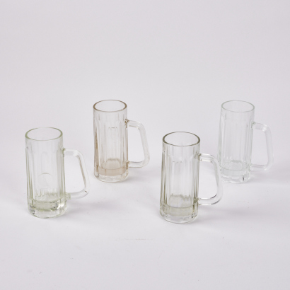 A Collection Of Four Vintage Beer Steins