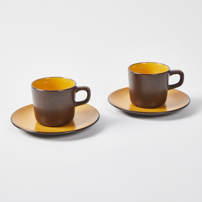 A Pair Of Terra Stone Coffee Cups And Saucers By Mikasa