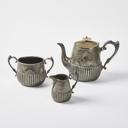 An Antique Hand Engraved Silver Plated Tea Set