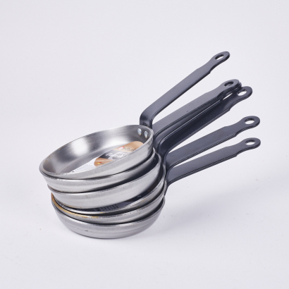 A Collection Of Six Small Spanish Made Garcima Polished Blini Pans