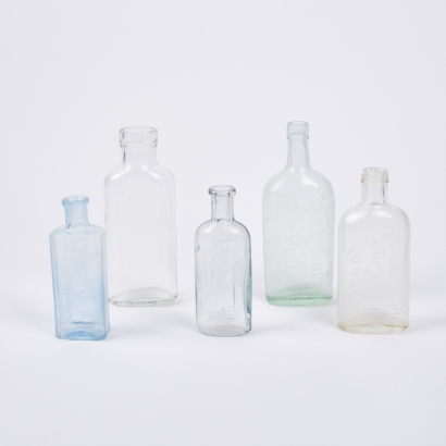 A Collection Of Five Vintage Bottles
