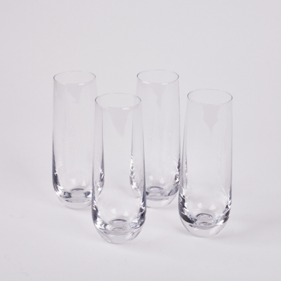 A Set Of Four Stemless Champagne Glasses