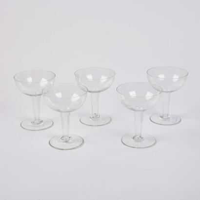 A Set Of Five Etched Hollow Stem Champagne Coupes