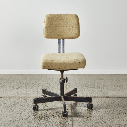 A Jr Holland Office Chair With A Plaid Covering