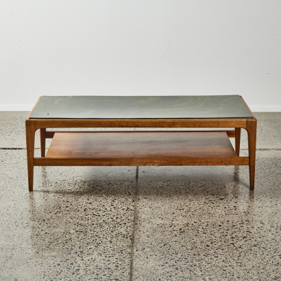 A Large Mid Century Coffee Table With A Faux Jade Top