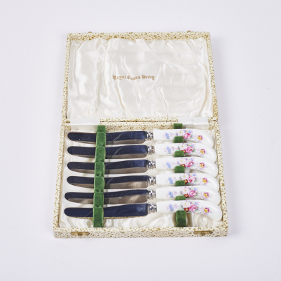 A Set of Six Floral Handled Butter Knifes