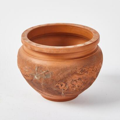 A Small Vase with Rasied Dragon Motifs