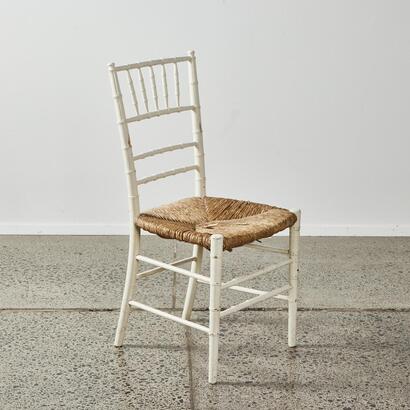 A Faux Bamboo Chair With Rush Seat