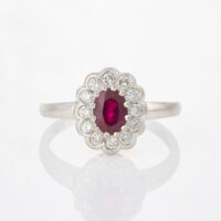 18ct White Gold, 1.28ct Oval Ruby / .43ct Diamond Ring