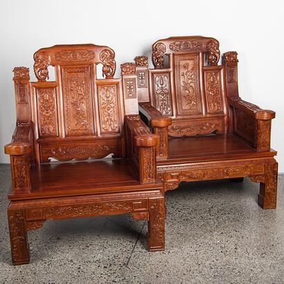 A pair of Chinese hardwood carved 'Ruyi 'armchairs