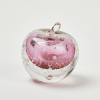 A Peter Raos Pink and Clear Apple Paper Weight