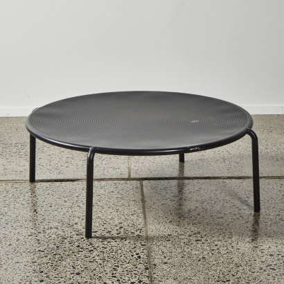 A Round Perforated Table