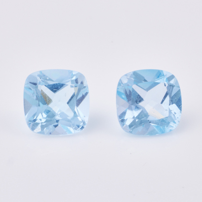 A Matched Pair of 10.71ct Cushion cut Topaz's