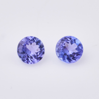 A Round Mixed Pair of Tanzanites, totalling 1.40cts