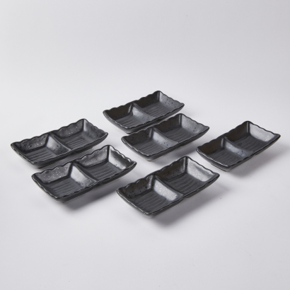 A Set of Four Sauce Dishes