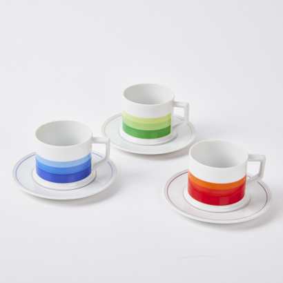 An Oggi Trio Cups And Saucers