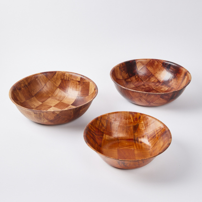 A Collection Of Three Wooden Salad Bowls