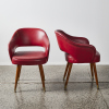 A Pair of Mid-Century Red Vinyl Armchairs