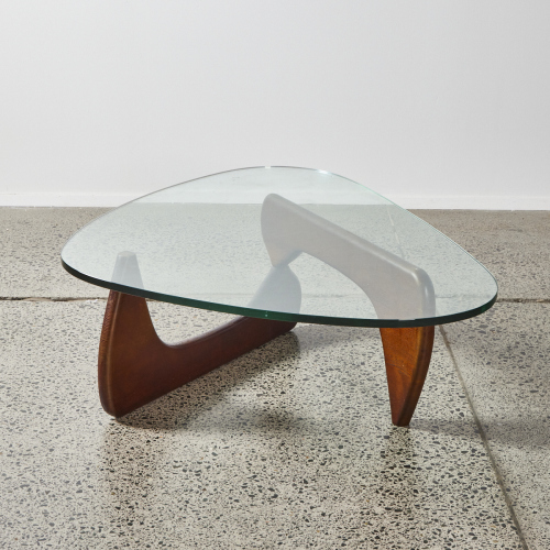 A Noguchi Style Coffee Table With Walnut Base