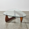 A Noguchi Style Coffee Table With Walnut Base