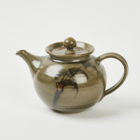 A Teapot, Creamer, and Sugar Bowl by P Laird Waimea Pottery