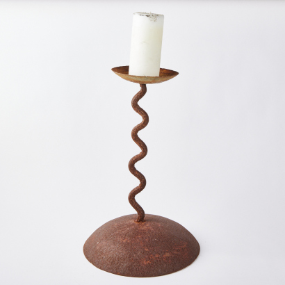 An Rusted Organic Formed Candle Stick Holder