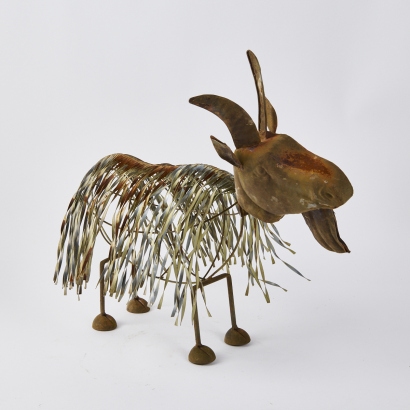 A Handmade Longhaired Metal Goat Sculpture