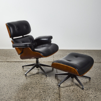 An Eames Style Lounge Chair With Footstool