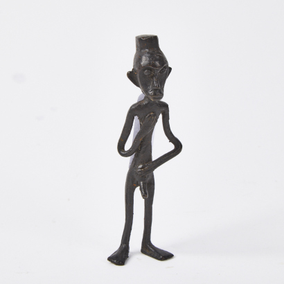 A Small Metal African Figure