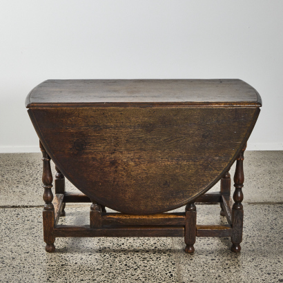 An 18th-century Oak Demi-Lune Table With Gate Leg