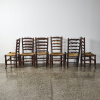 A Suit Of Six Ash And Rush-Back Dinning Chairs