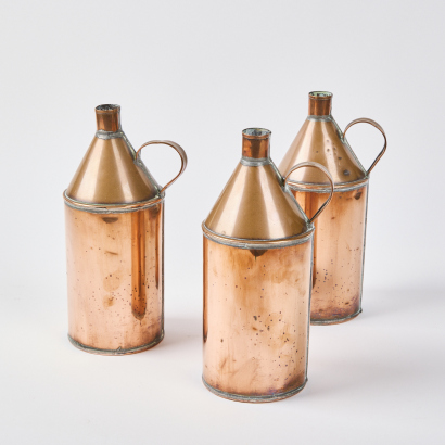 A Trio Of Copper Jugs