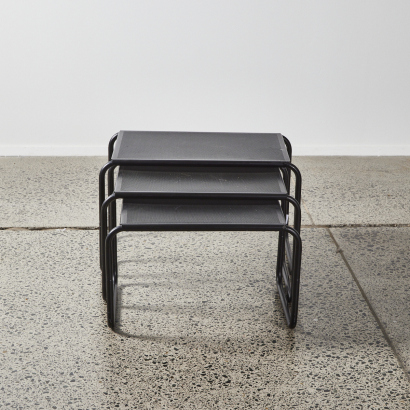 A Black Perforated Metal Nesting Tables