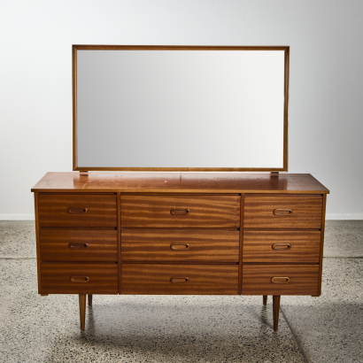 A Mid-Century Six Drawer With A Mirror