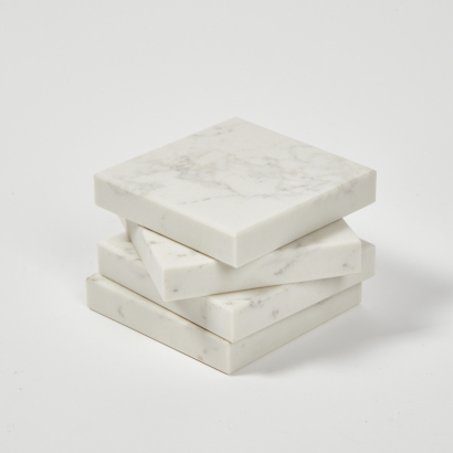 A Set Of Four Marble Table Plinths