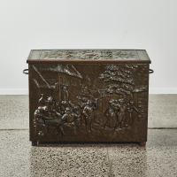 An Embossed Brass Log Box